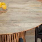 Solid wood dining table 4 seater, Round wooden dining table India, Space-saving furniture for small homes.