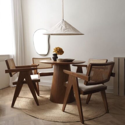 Space saving solid wood round dining table for modern Indian homes