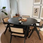 round-wooden-dining-table-small-living-room.jpg