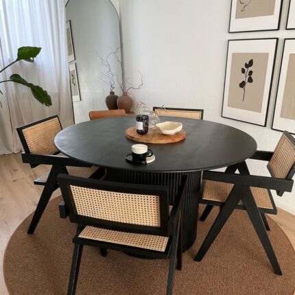round-wooden-dining-table-small-living-room.jpg